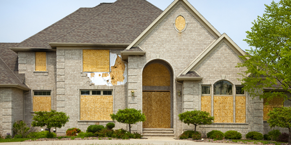 What to consider before you file a claim after a storm damages your house
